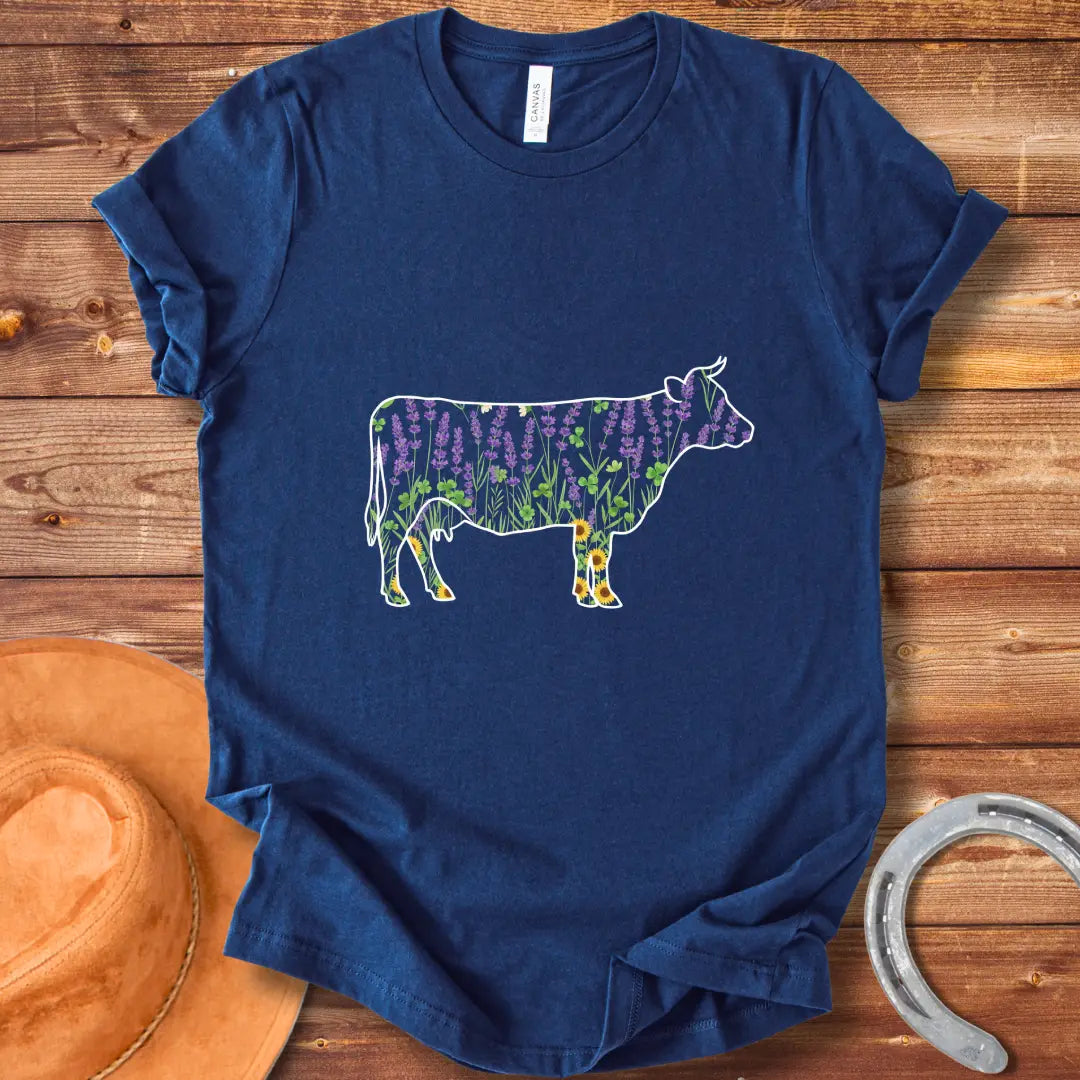 Silhouette of a cow filled with lavender, sunflowers, and clover flowers.