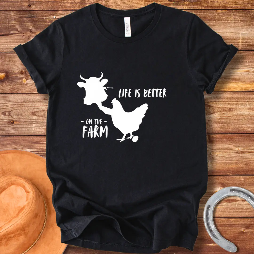 Black and white t-shirt design featuring a cow and the words 'Life is Better' for Cow Lovers Clothing.
