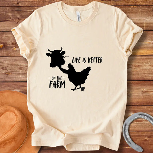 Black and white t-shirt design featuring a cow and the words 'Life is Better' for Cow Lovers Clothing.