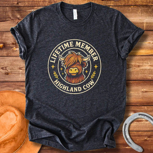 Lifetime Member Highland Cow T-Shirt design featuring a friendly and fluffy Highland cow face inside a circular badge.