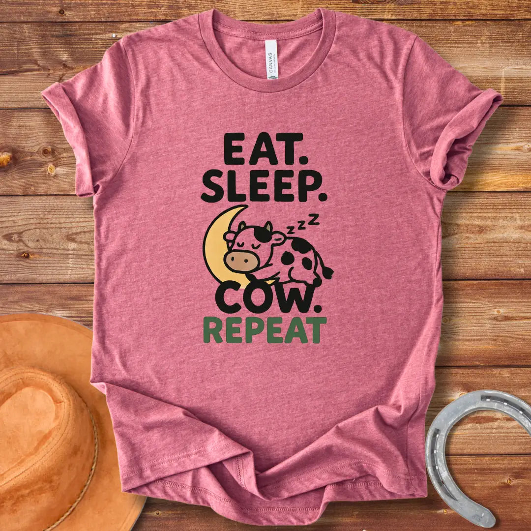 Line art illustration of a sleeping cow on a crescent moon with the text 'Eat Sleep Cow Repeat' 