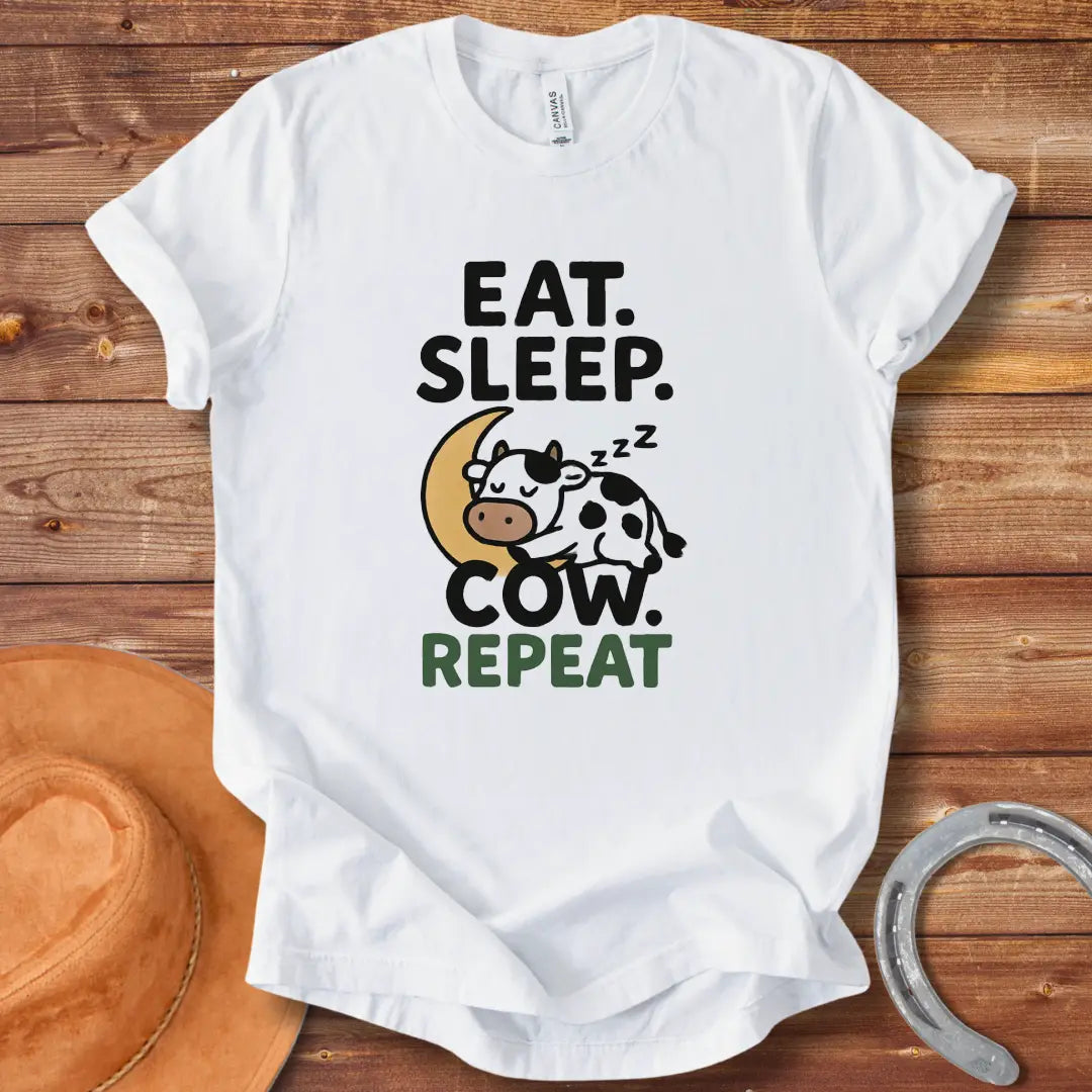 Line art illustration of a sleeping cow on a crescent moon with the text 'Eat Sleep Cow Repeat' 