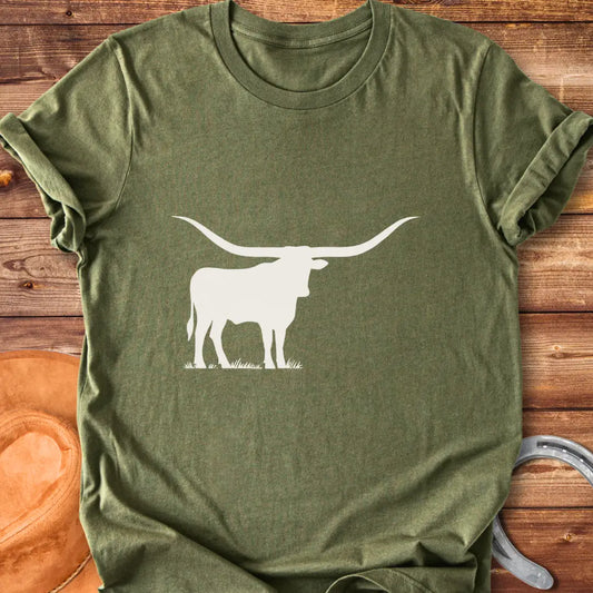 Silhouette of a longhorn on a prairie background, perfect for cow lovers.