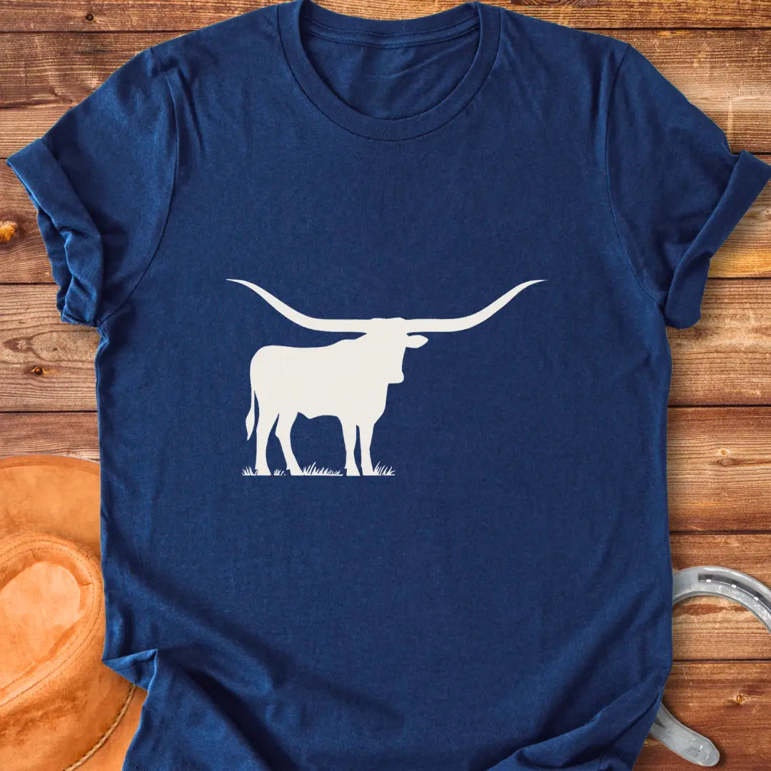 Silhouette of a longhorn on a prairie background, perfect for cow lovers.