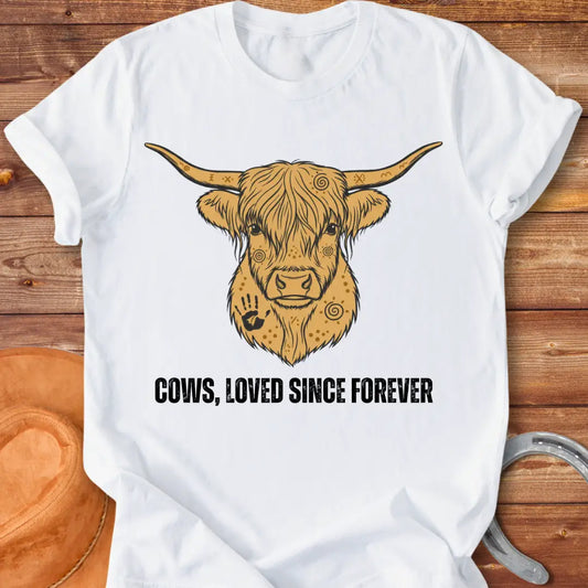 Loved Since Forever T-Shirt featuring a detailed illustration of a Highland cow's face with ornamental details