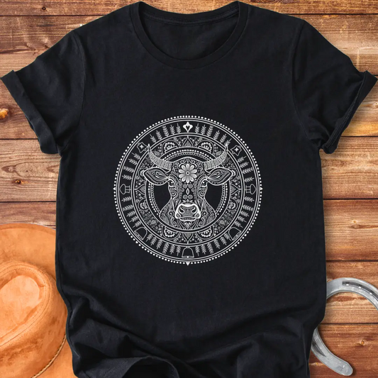 Intricate mandala design featuring a cow head on a black t-shirt