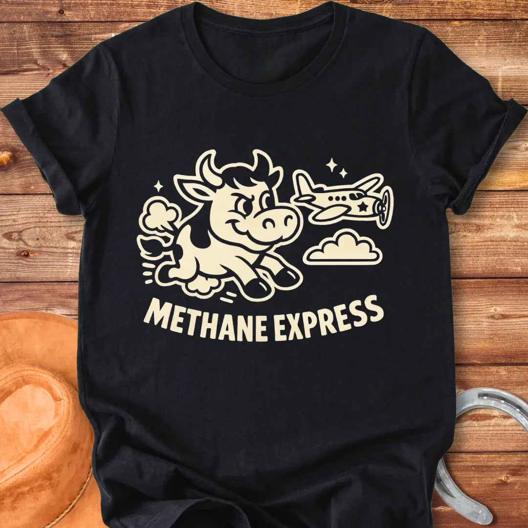 Cartoon cow running alongside airplane on black t-shirt, with the words Methane Express