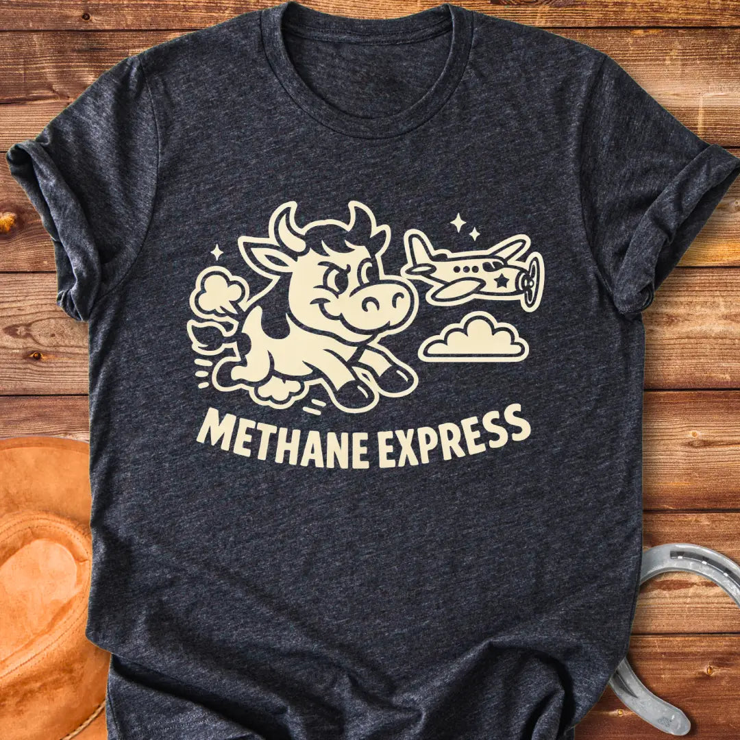 Cartoon cow running alongside airplane on black t-shirt, with the words Methane Express