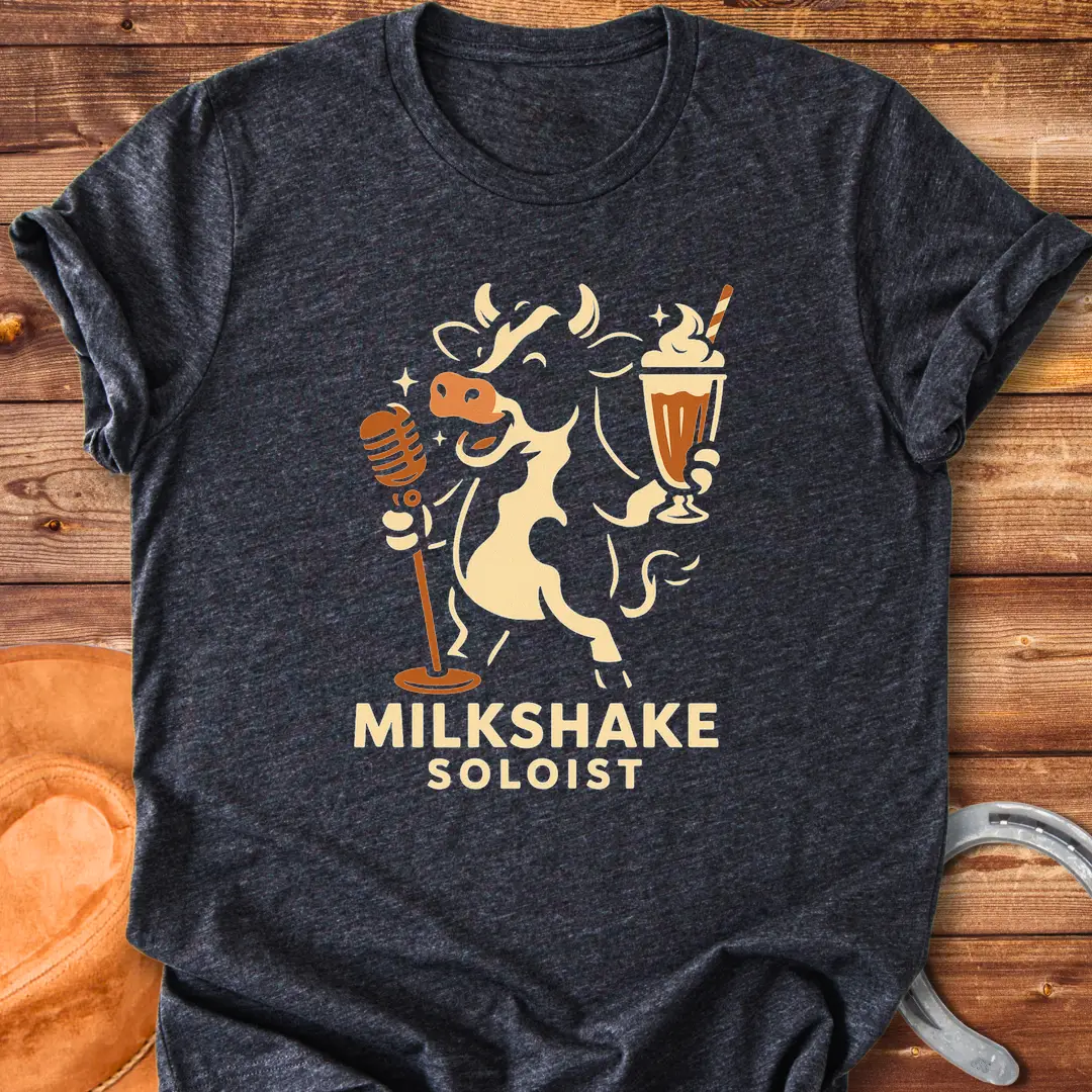 Milkshake Soloist T-Shirt featuring a cartoon cow holding a microphone and a milkshake with stars