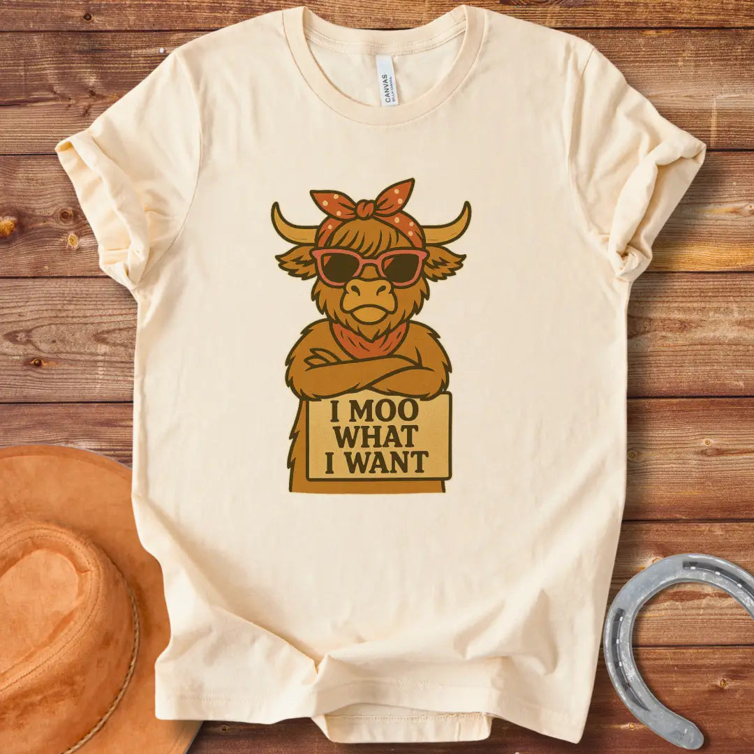Cool cow with sunglasses and a bandana holding a sign that says 'I Moo What I Want'