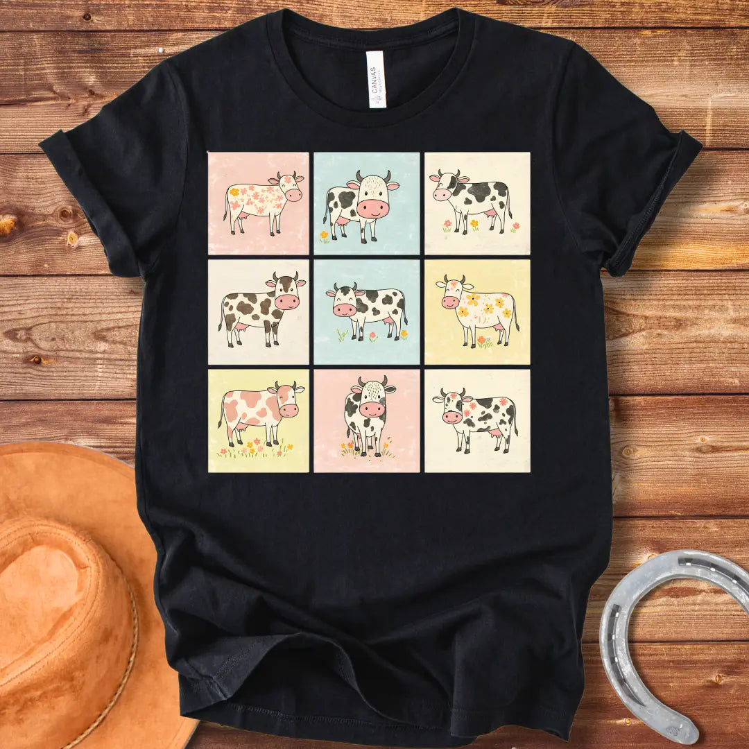 Moo-zaic T-Shirt featuring a mosaic of cute cartoon cows in a variety of colors and patterns, representing the different breeds with floral elements.