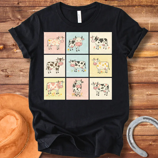 Moo-zaic T-Shirt featuring a mosaic of cute cartoon cows in a variety of colors and patterns, representing the different breeds with floral elements.