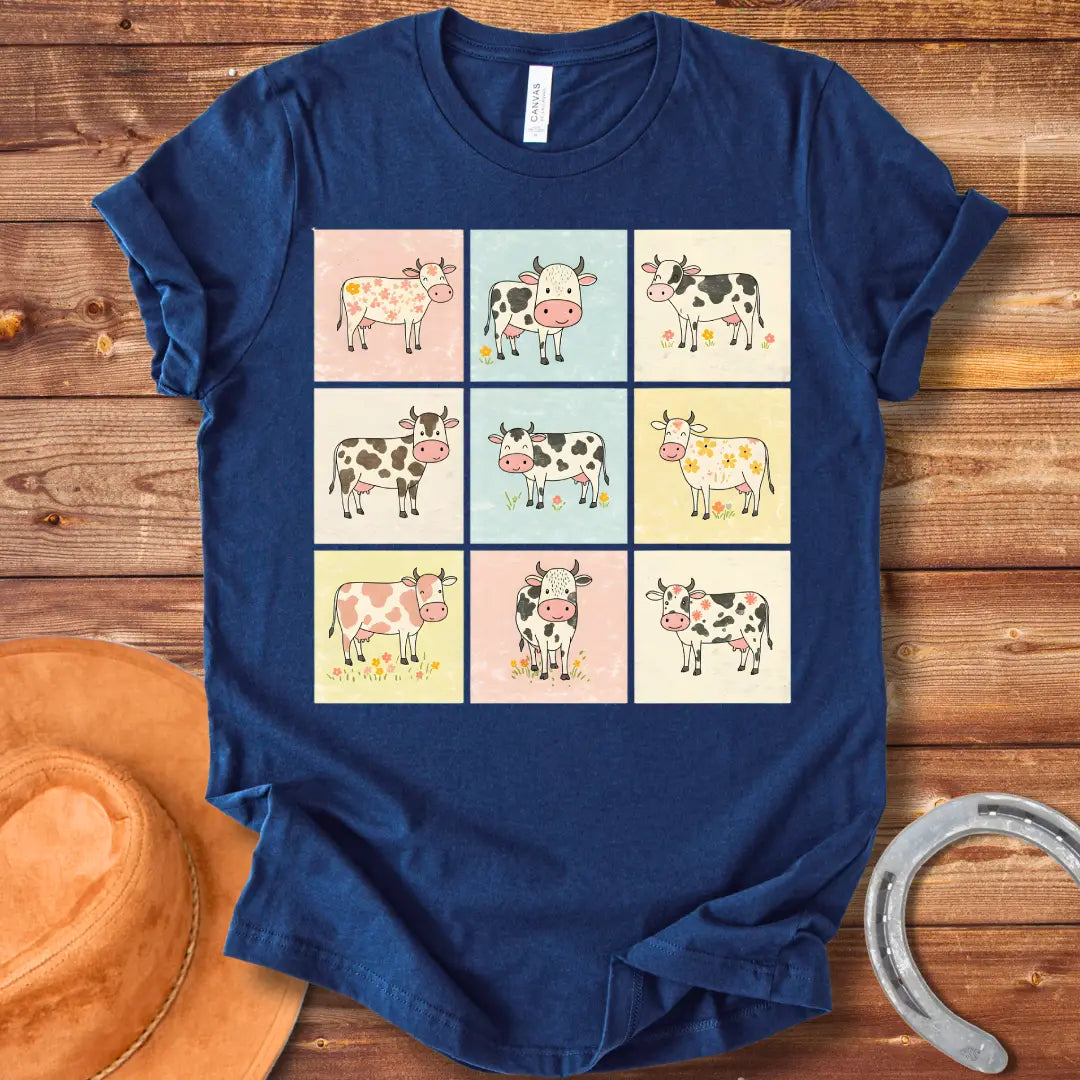Moo-zaic T-Shirt featuring a mosaic of cute cartoon cows in a variety of colors and patterns, representing the different breeds with floral elements.