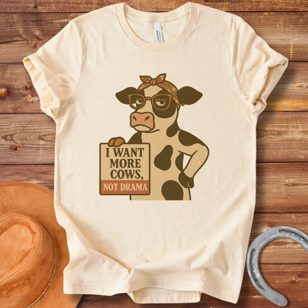 Illustration of a cool cow wearing glasses and a bandana, holding a sign that says 'I Want More Cows, Not Drama'.