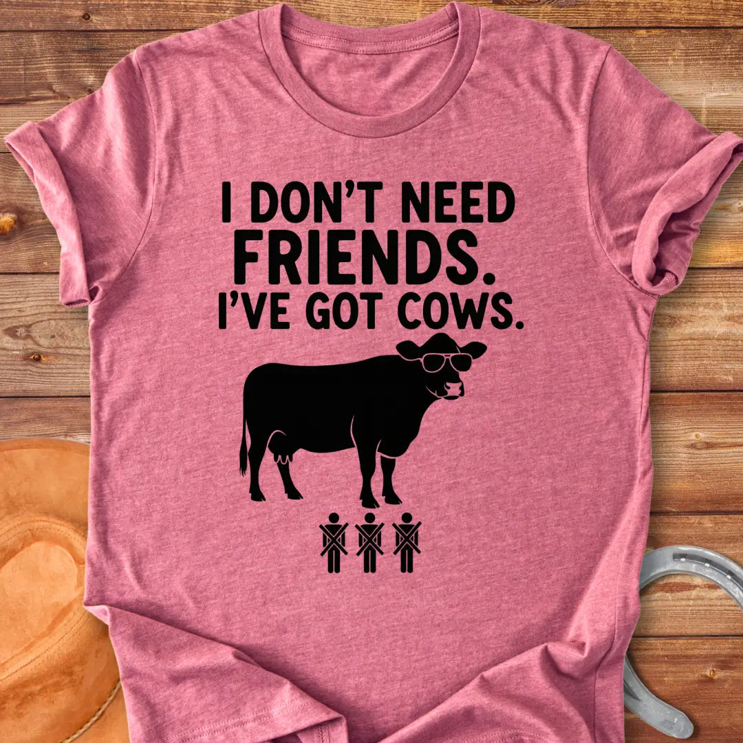 Black and white t-shirt with the text 'I don't need friends, I've got cows' and a cow wearing sunglasses and crossed out stick figures.