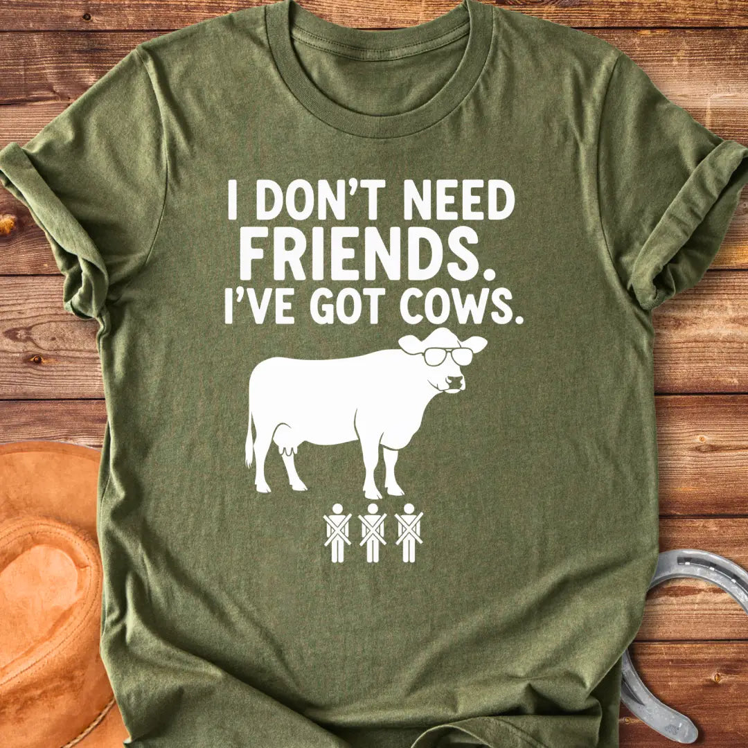 Black and white t-shirt with the text 'I don't need friends, I've got cows' and a cow wearing sunglasses and crossed out stick figures.
