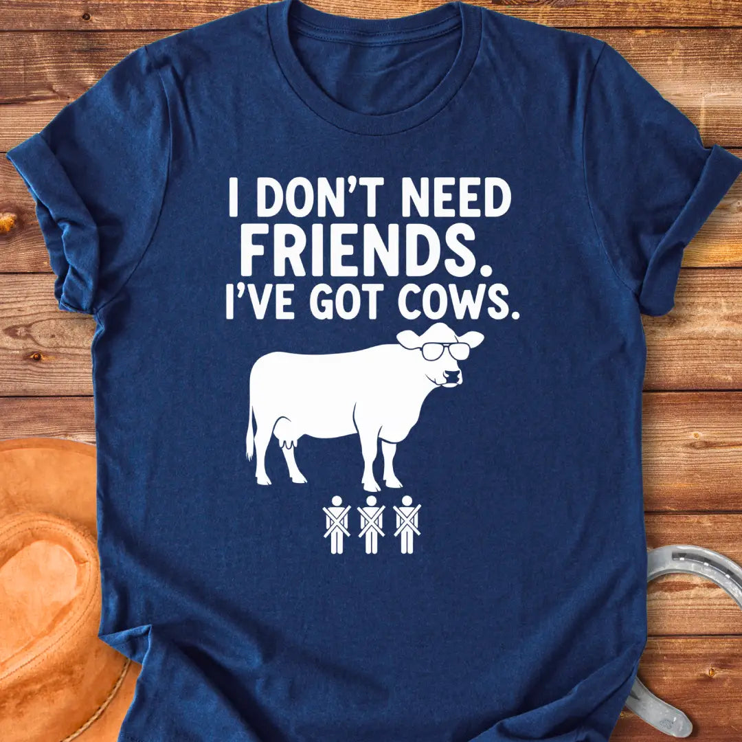 Black and white t-shirt with the text 'I don't need friends, I've got cows' and a cow wearing sunglasses and crossed out stick figures.