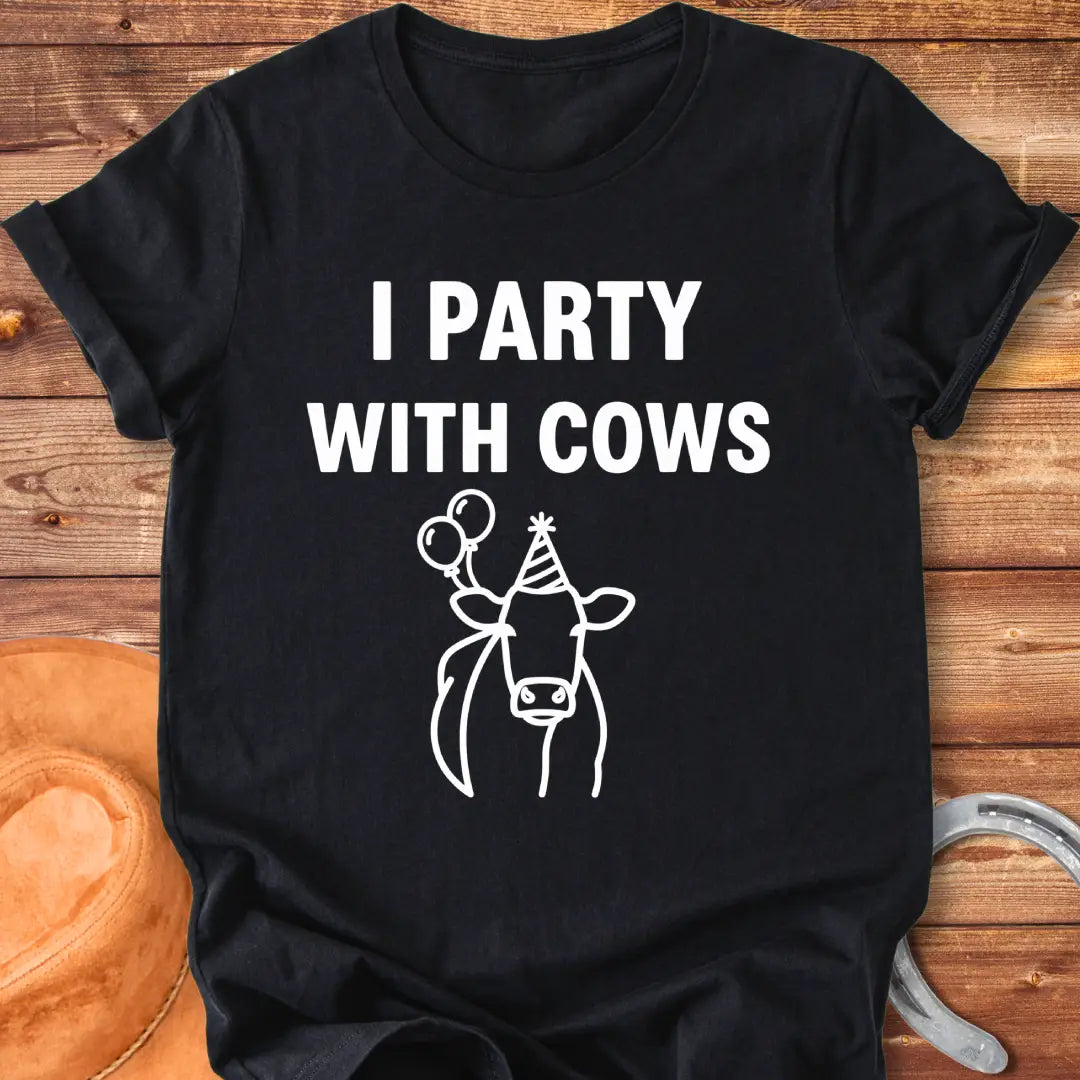 Party With Cows T-Shirt - Design features a cow wearing a party hat and holding balloons.