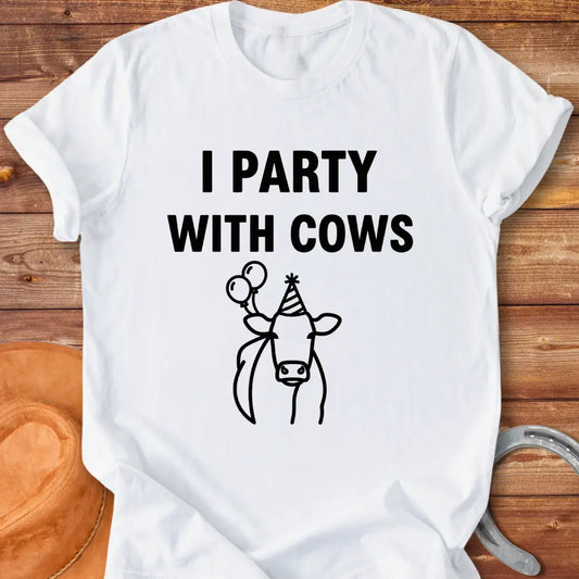 Party With Cows T-Shirt - Design features a cow wearing a party hat and holding balloons.