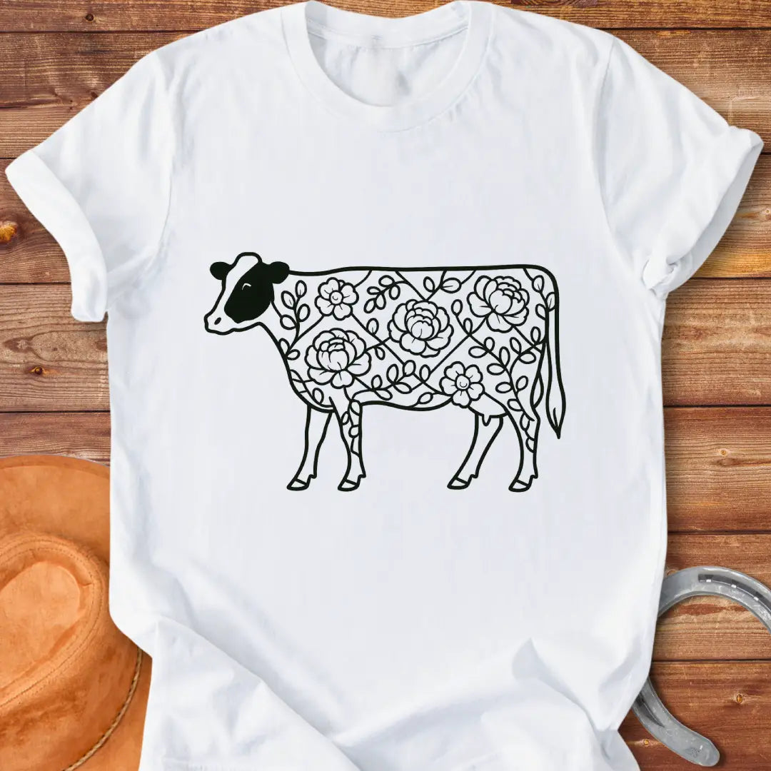 Silhouette of a holstein cow filled with peony flowers and eucalyptus leaves, in green outline.