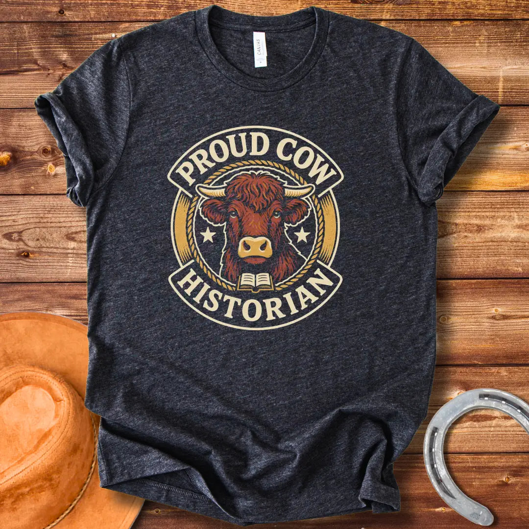 Proud Cow Historian T-Shirt featuring a highland cow, books, and stars.