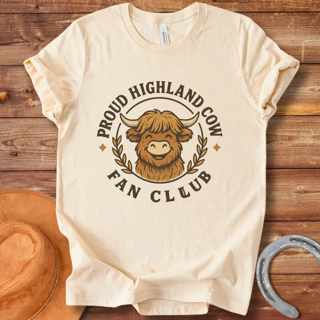 Smiling Highland Cow Fan Club T-Shirt design in a circle with olive branches