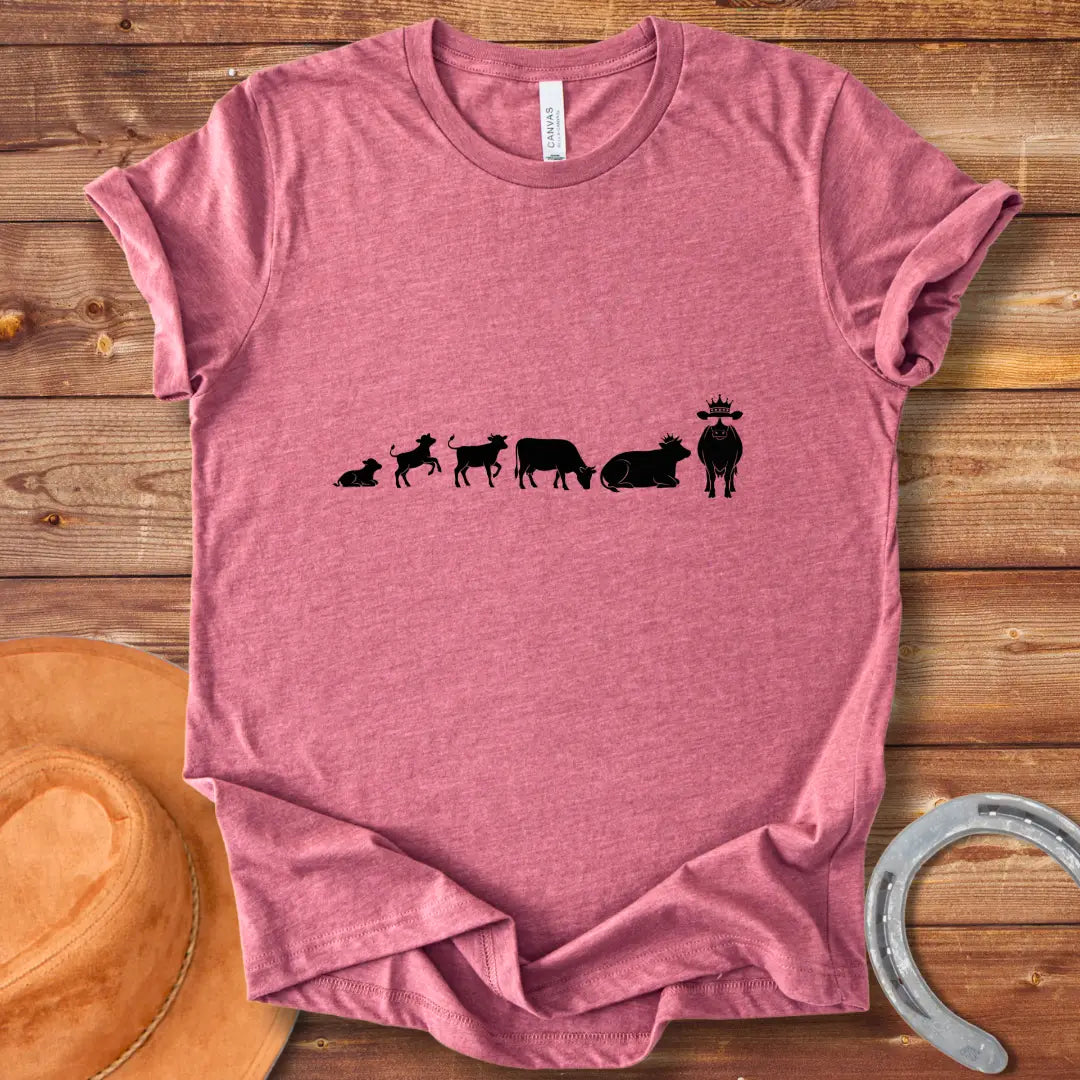 Evolution of a cow t-shirt design, featuring the stages of a cow's evolution.