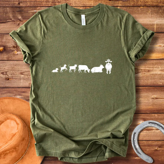 Evolution of a cow t-shirt design, featuring the stages of a cow's evolution.