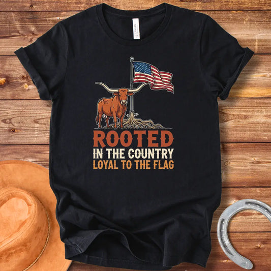 Rooted in the Country T-Shirt featuring a longhorn with roots and the American flag, representing country pride.