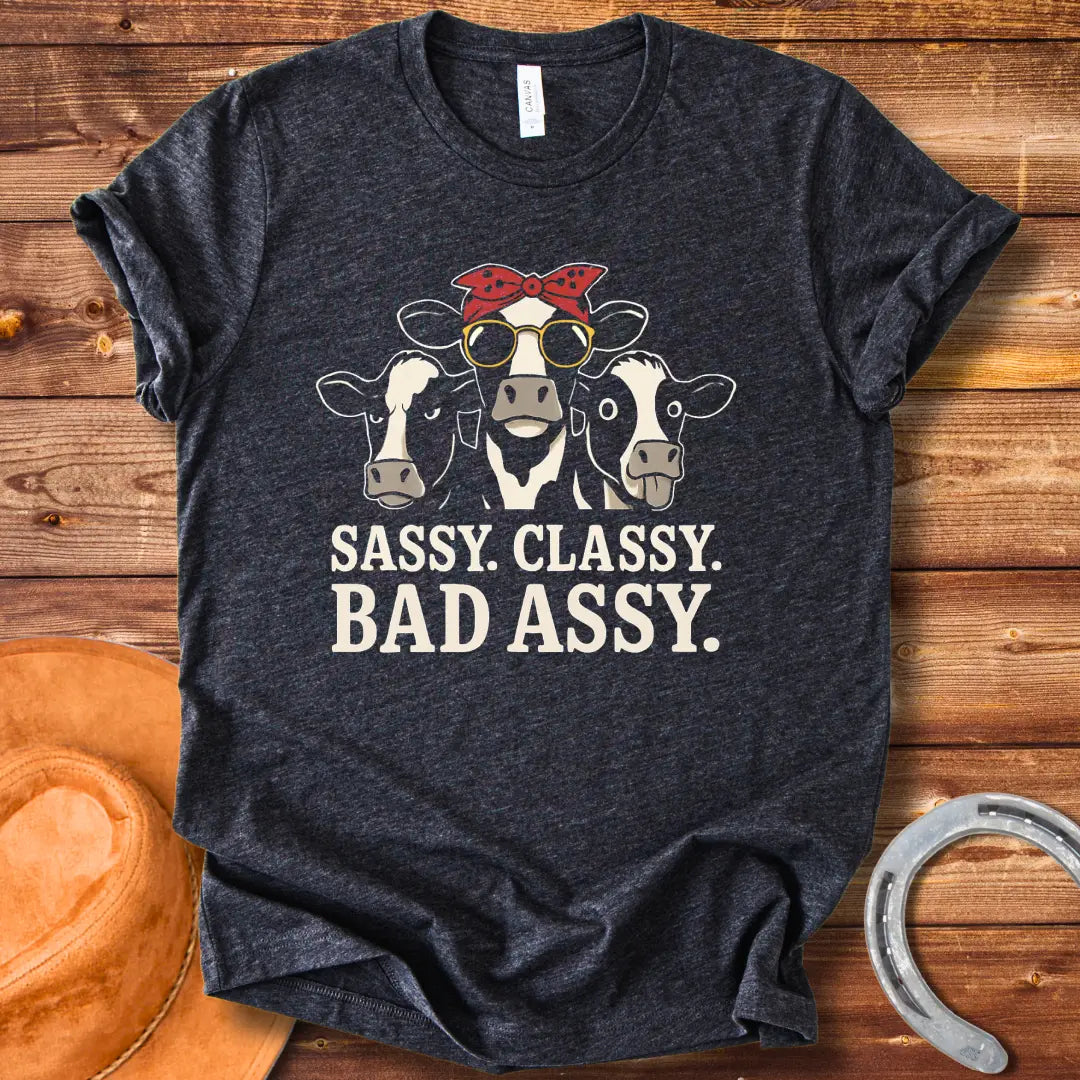 Illustration of three sassy cows wearing sunglasses and bandanas with the words 'Sassy Classy Bad Assy' below.