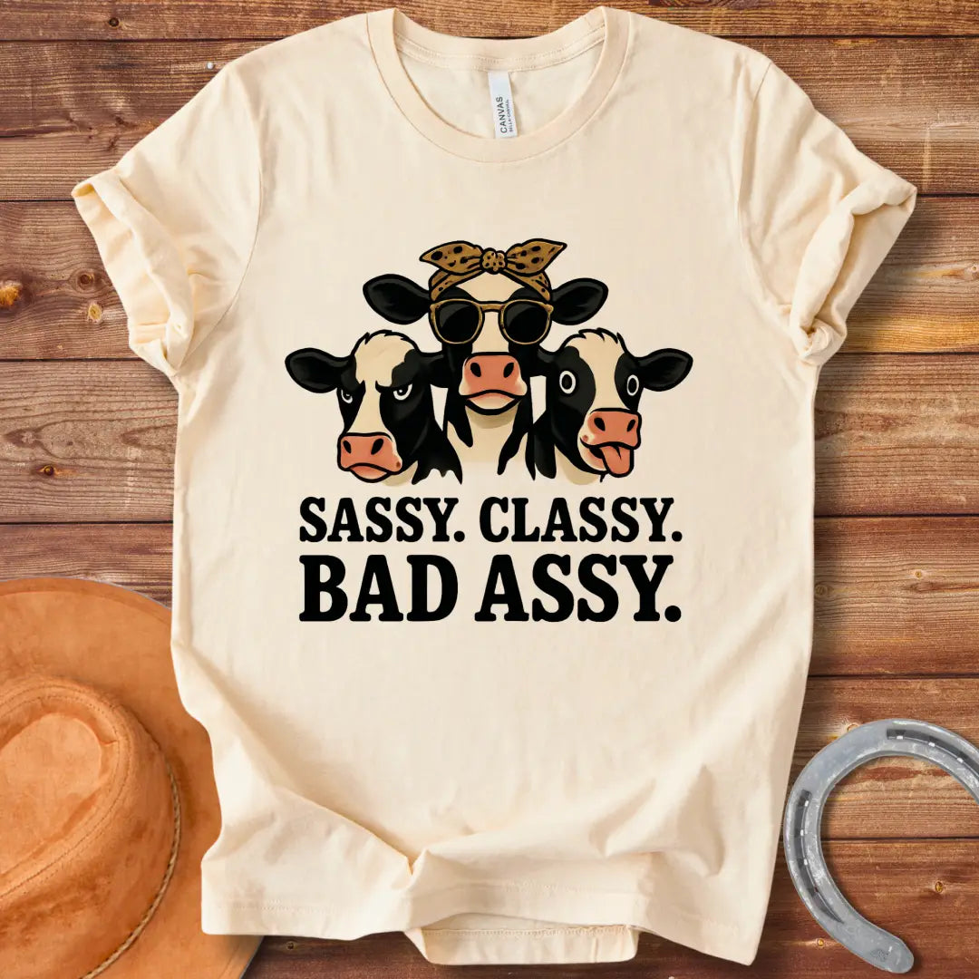 Illustration of three sassy cows wearing sunglasses and bandanas with the words 'Sassy Classy Bad Assy' below.