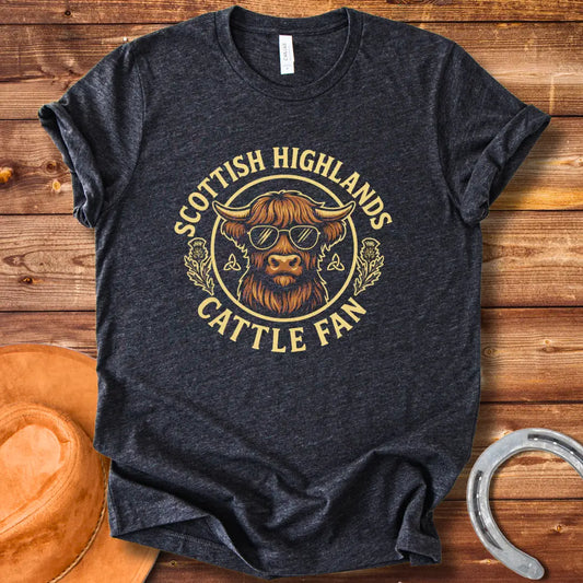 Scottish Highland cow wearing sunglasses, surrounded by text and thistle artwork