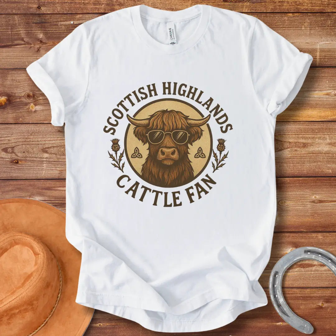 Scottish Highland cow wearing sunglasses, surrounded by text and thistle artwork