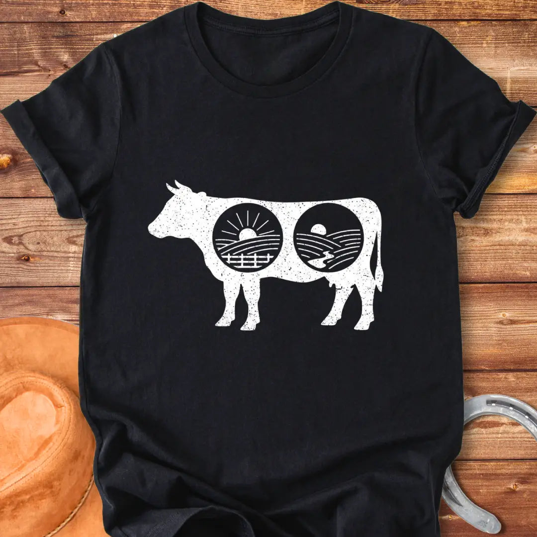 Cow silhouette t-shirt with farm landscapes inside, representing a starry night and a sunrise and sunset