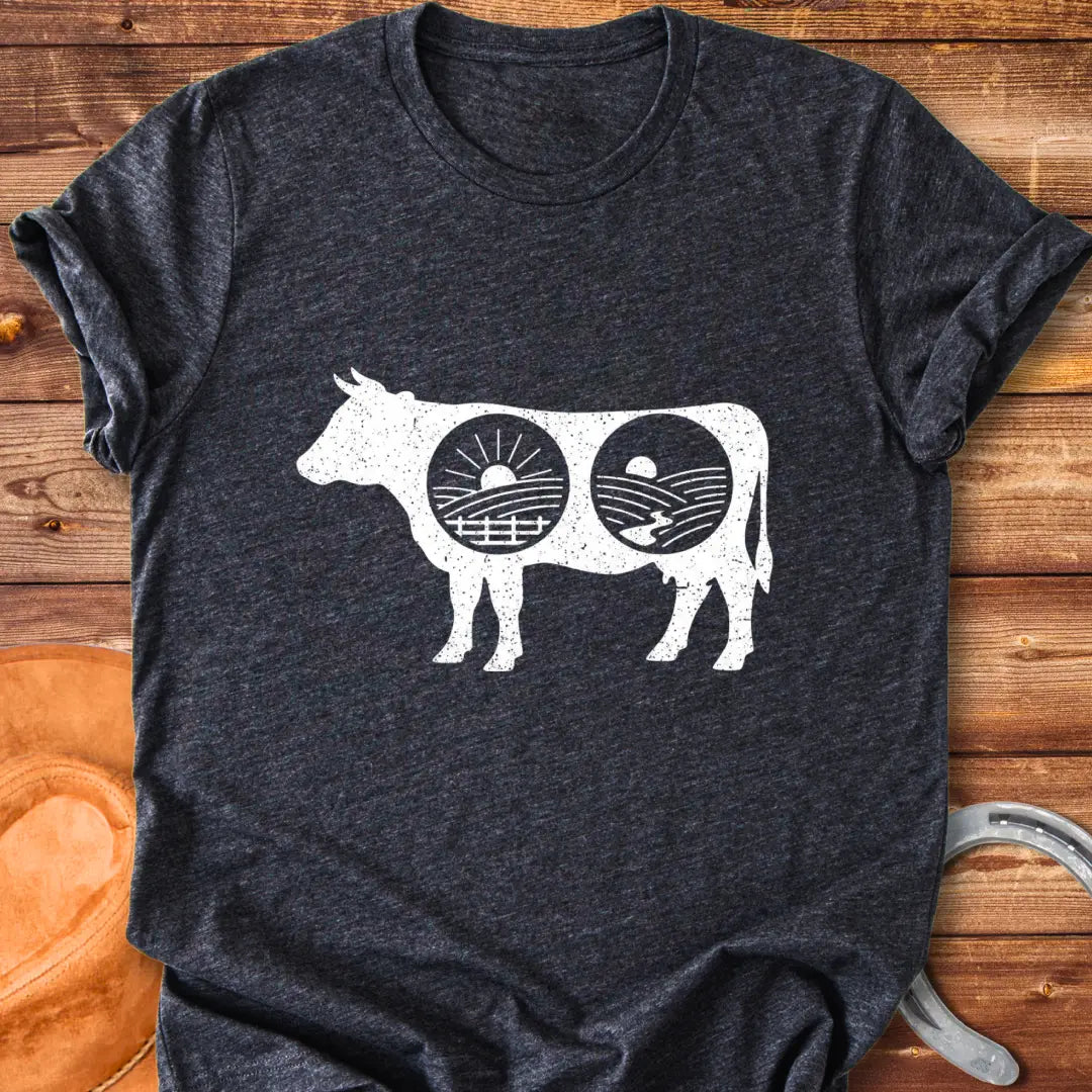 Cow silhouette t-shirt with farm landscapes inside, representing a starry night and a sunrise and sunset