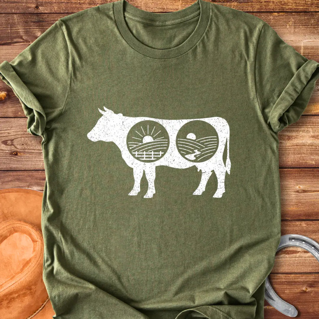 Cow silhouette t-shirt with farm landscapes inside, representing a starry night and a sunrise and sunset