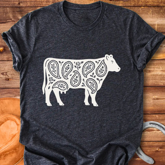 Black cow silhouette with paisley teardrop and rose floral pattern
