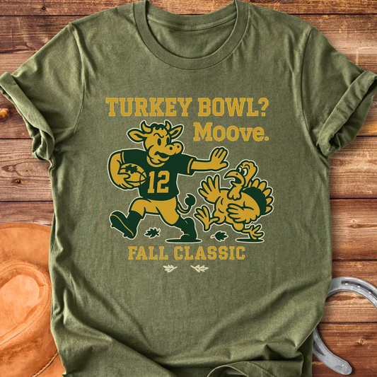 Illustration of a cow playing football and chasing a turkey with the words 'Turkey Bowl? Moove. Fall Classic' above and below them.
