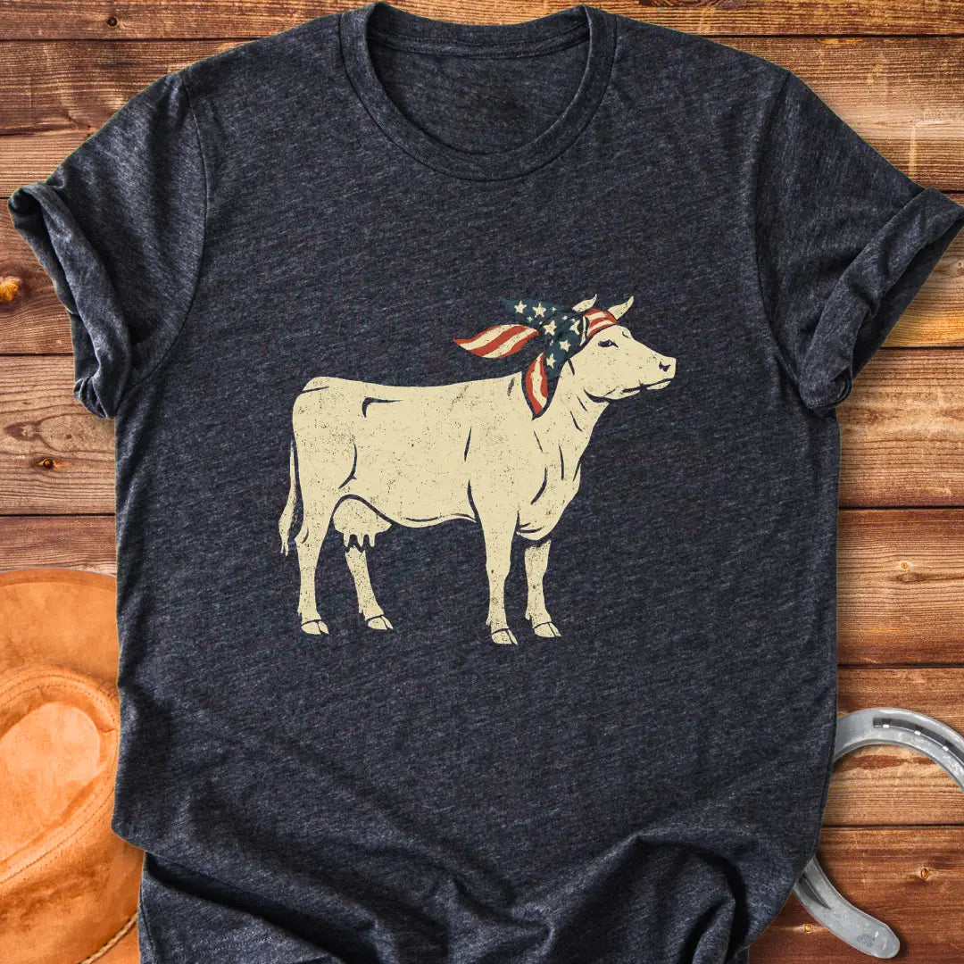 USA Cowgirl T-Shirt featuring a brown cow wearing an American flag bandana, patriotic cow design