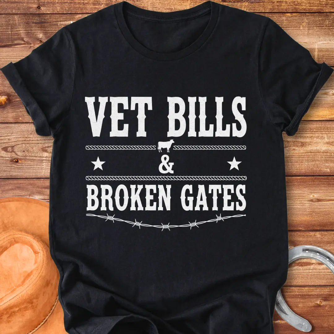 Vet Bills and Broken Gates t-shirt design with a cow silhouette, stars, and barbed wire.