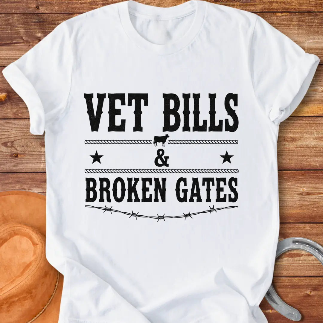 Vet Bills and Broken Gates t-shirt design with a cow silhouette, stars, and barbed wire.